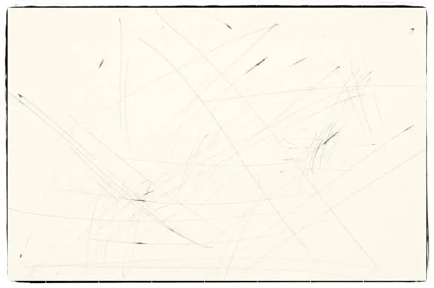 Photo of Scribbles with pen on sepia paper with borders. For texture or background.