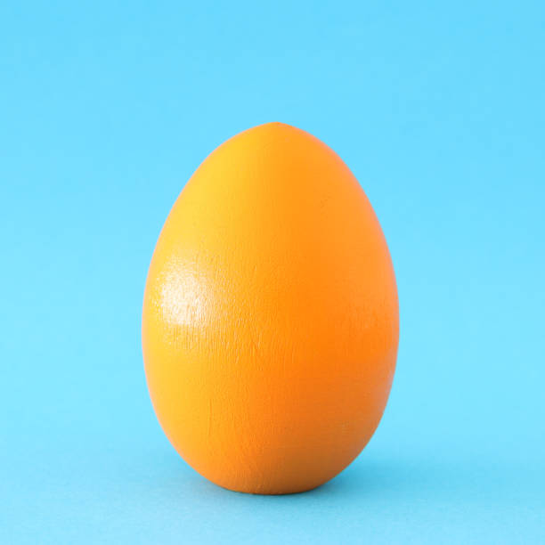 istock concept image of egg shape over blue pastel background. minimal an pop art concept. 1051789358