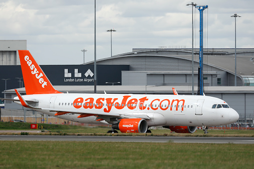 easyJet Airbus A320 registration G-EZWM taxiing on August 24th 2018 for a flight to Vienna from London Luton Airport, Bedfordshire, UK