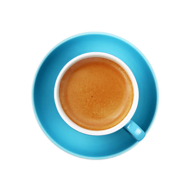 istock Full espresso coffee in blue cup close up isolated 1051792868