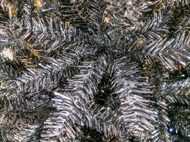 istock Detail of an artificial silver Christmas tree 1051796678