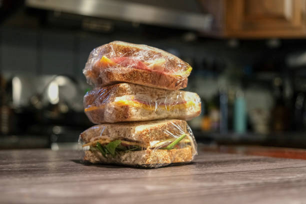 stacked sandwich halves on counter stacked sandwich halves on kitchen counter polythene photos stock pictures, royalty-free photos & images