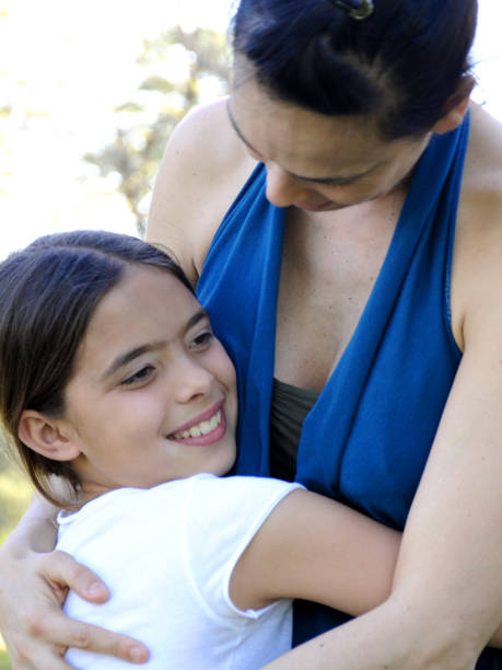 istock portrait mother and daughter 1051798312