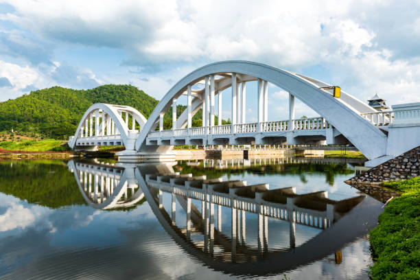 istock Old white railway bridge constructed at Lamphun, Thailand. 1051799904