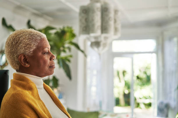 istock senior woman mindfulness moment. 1051804556