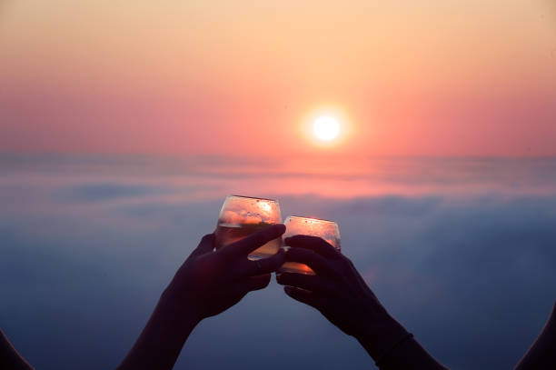 istock After Work Romantic Sundowners Above the clouds at a pink sunset 1051804986