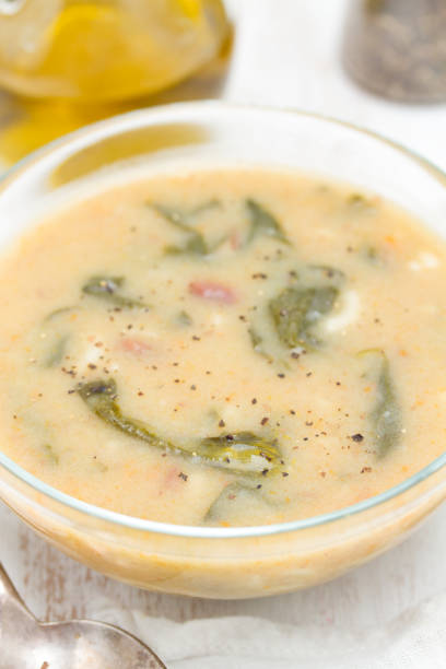 istock vegetable soup with spinach, beans and pasta in bowl 1051805966