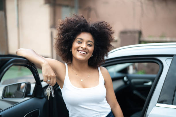 istock Woman Driver Portrait with Car Keys 1051820706