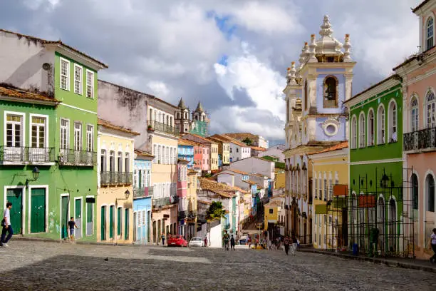 Colorful houses in the historic center of Salvador in Bahia / Brasil. A myth says that every cobblestone is one slave who died in this place