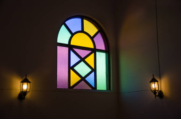 istock colorful glass window with lamp light 1051825904
