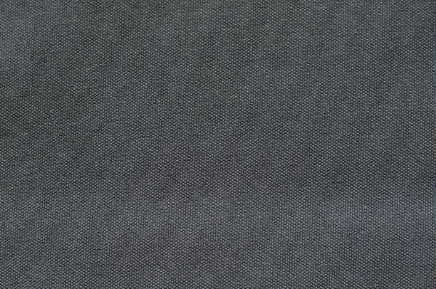 istock The photo of dark grey cloth taking as background. 1051831570