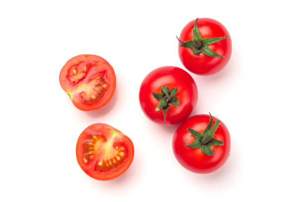 istock Close-up view of fresh tomato isolated on white background. 1051846208
