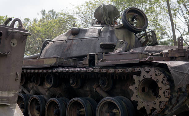 istock old military equipment destroyed in battles and wars. Tanks as a murder weapon 1051866638