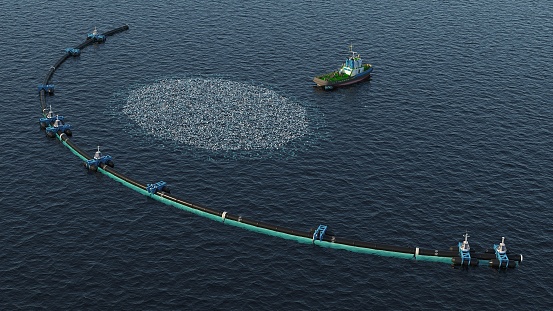 3d render of an ocean cleaning system with garbage on the water