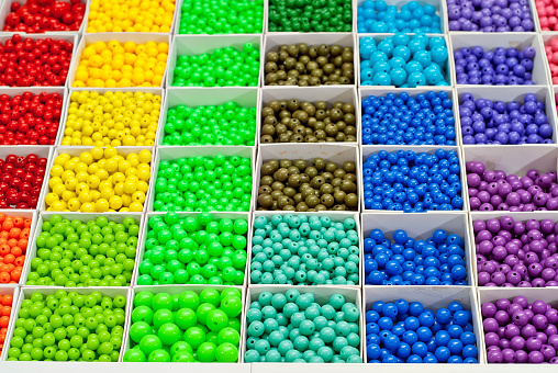 Multicolored beads in a in bijouterie shop for handmade accessories