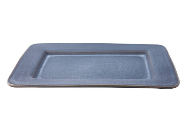 istock Blue ceramic ware made of white plate on white 1051975934