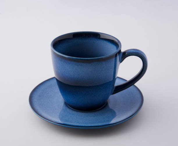 istock Dark blue glass textured coffee cup 1051980706
