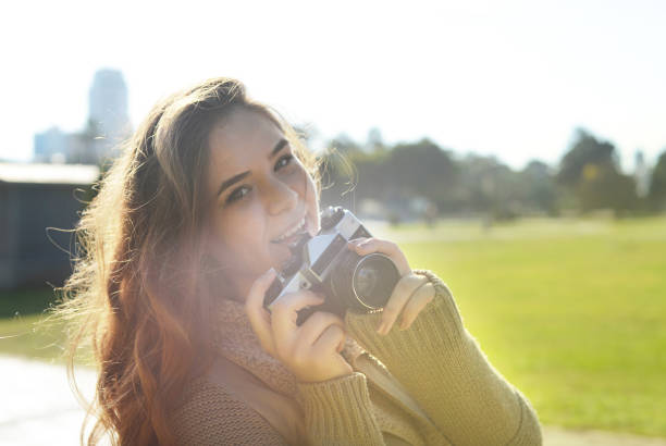 istock Woman taking pictures 1052003812