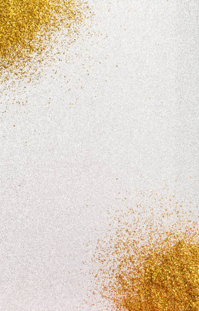 istock Silver background with gold glitter in the corners. 1052006780
