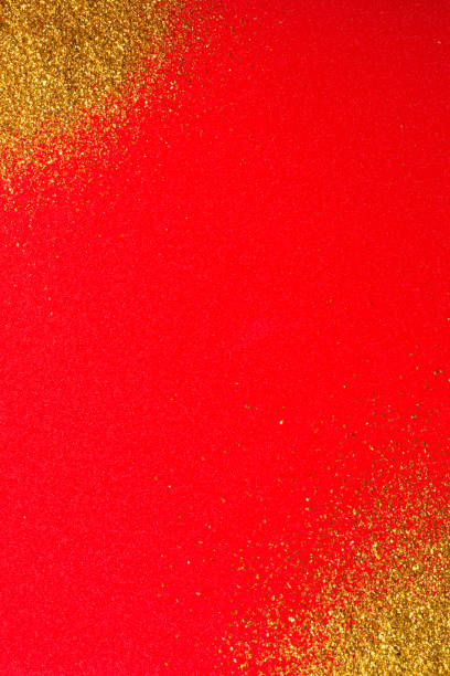 istock Red background with gold glitter in the corners. 1052006810