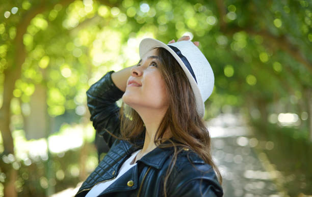 istock The Woman With Hat 1052007240