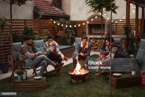 Relaxing Evening By The Fire Stock Photo - Download Image Now - Fire Pit, Yard - Grounds, Winter