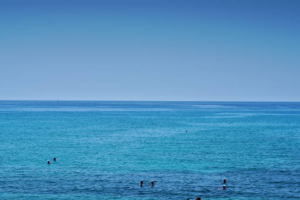 istock swimming in the Mediterranean 1052047074