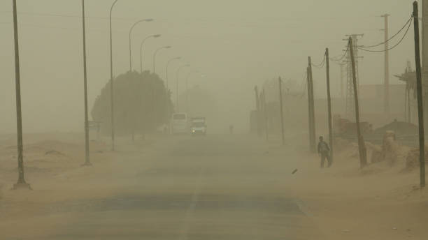 Sandstorm This is a sandstorm in the city of Erfoud, Morocco. dust storm stock pictures, royalty-free photos & images