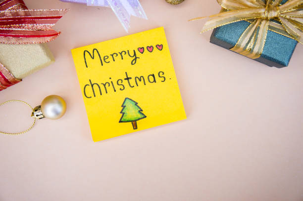 istock christmas background  and paper note merry christmas decor on background 1052048754