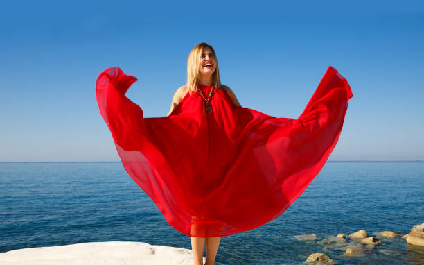 istock Woman in the red dress 1052049178