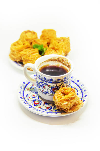 istock Eastern sweetness, baklava with peanuts and honey. Isolate. Selective focus. 1052061412