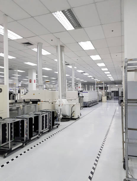istock Clean production room. Manufacture of industrial electronics. Surface-mounted circuit board assembly. 1052079040