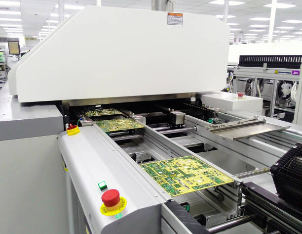 istock Clean production room. Manufacture of industrial electronics. Surface-mounted circuit board assembly. 1052087152