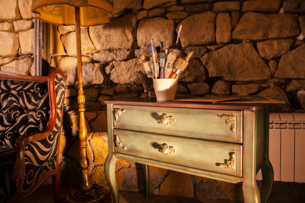 istock Old style chest of drawers with a paintbrush 1052098276