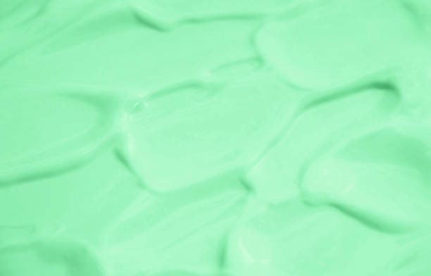 istock the mask cream to the face and body. Selective focus. 1052098806