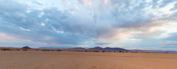 istock Panorama of clouds in the desert 1052099092