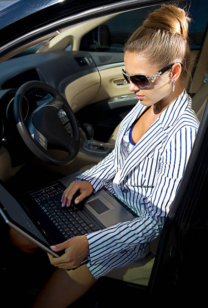 istock businesswoman uses laptop 105211653
