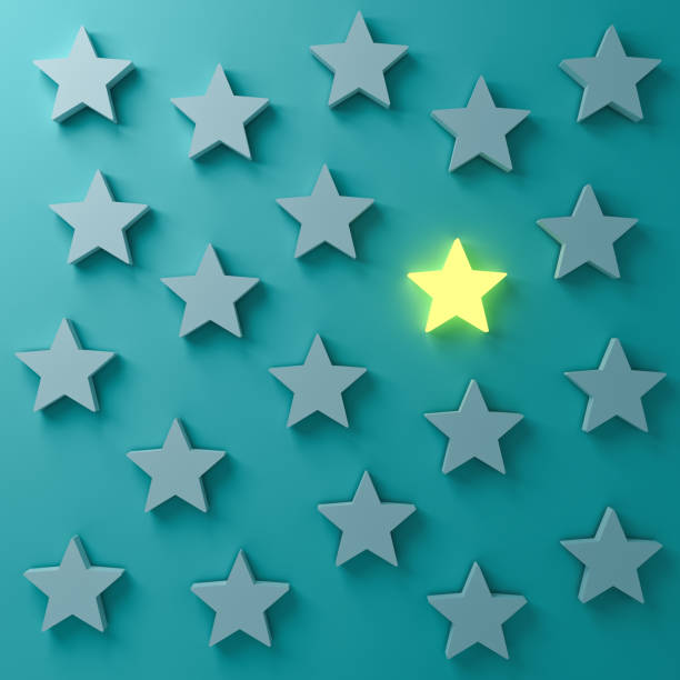 istock Stand out from the crowd and different creative idea concepts One glowing star standing among other dim stars on dark  blue  green pastel color wall background with shadows 3D rendering 1052147618