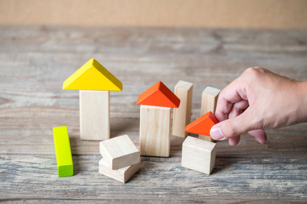 istock Wood Home & housing estate concept 1052167530