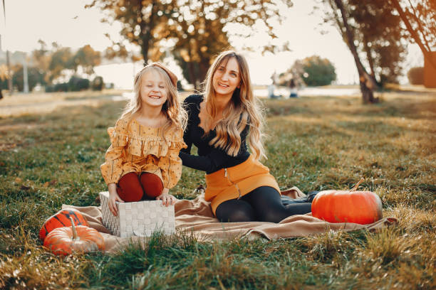 istock Family with pumpkins 1052172746