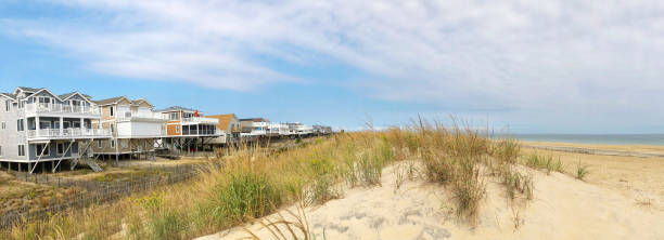 istock Dune constructed by the Army Corps of Engineers protecting oceanfront homes in South Bethany Beach, Delaware 1052173318