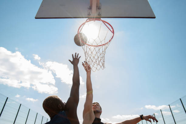 Basketball Players in Sunlight
