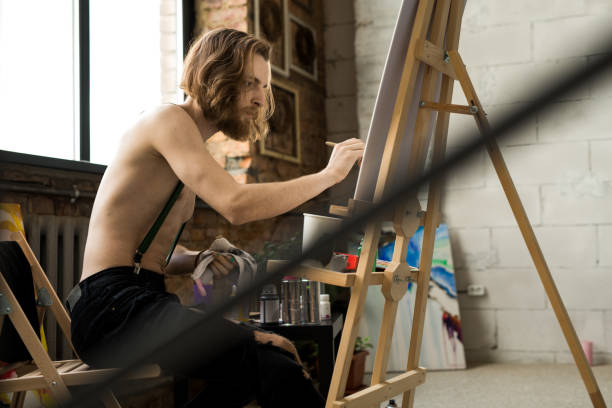 istock Male Artist in Studio 1052177328
