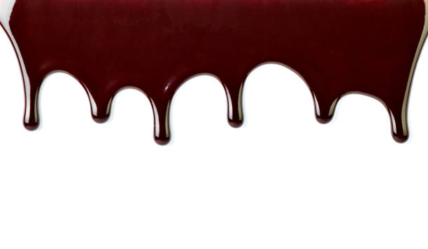 istock chocolate syrup dessert food sweet leaking drop 1052188880