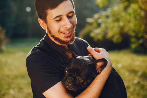istock Man with french bulldog 1052195764