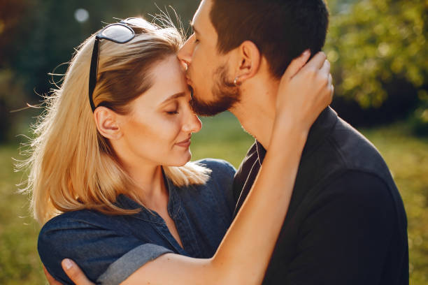istock happy young couple in the park 1052196444