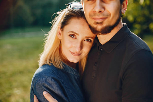 istock happy young couple in the park 1052198480