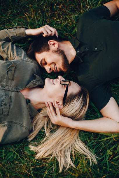 istock happy young couple in the park 1052198666