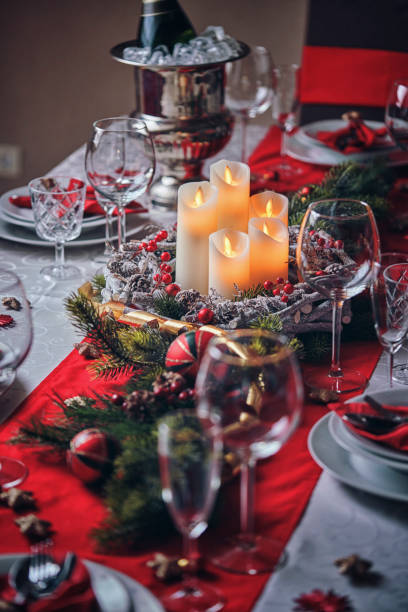 istock Decorated Table for Christmas Dinner with Candles and Christmas Ornaments 1052203216