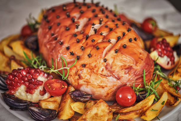 Glazed Holiday Ham with Cloves Served for Holiday Dinner